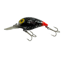 Load image into Gallery viewer, Left Facing View of SPECIAL PRODUCTION STORM LURES MAGNUM WIGGLE WART Fishing Lure. BLACK GLITTER / RED TAIL. Known to Collectors as MICHAEL JACKSON with RED TAIL.