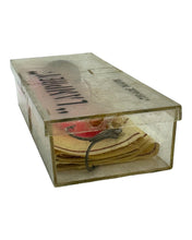 Load image into Gallery viewer, Additional Box End View of Mid-Century Modern Lamprey Lure And Tackle Company of Chicago, Illinois "THE ORIGINAL LAMPREY" Vintage Fishing Lure in PIPED LIGHT RED & BLACK. Original Box & Insert Included.