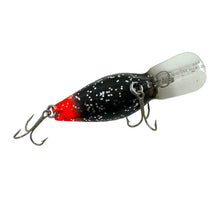Load image into Gallery viewer, Belly View of SPECIAL PRODUCTION STORM LURES MAGNUM WIGGLE WART Fishing Lure. BLACK GLITTER / RED TAIL. Known to Collectors as MICHAEL JACKSON with RED TAIL.