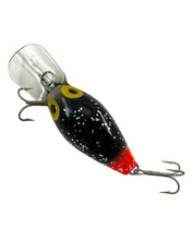 Load image into Gallery viewer, Top View of SPECIAL PRODUCTION STORM LURES MAGNUM WIGGLE WART Fishing Lure. BLACK GLITTER / RED TAIL. Known to Collectors as MICHAEL JACKSON with RED TAIL.