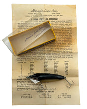 Load image into Gallery viewer, Insert View of MIRACLE LURES LITTLE MO MIRACLE LURE in Black. Vintage Fishing Lure from Largo, Florida