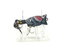 Cargar imagen en el visor de la galería, Right Facing View of Fred Arbogast 1/4 oz HULA POPPER Fishing Lure with Original Box in Blackbird