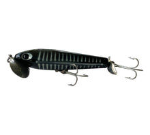 Charger l'image dans la galerie, Left Facing View of 5/8 oz Fred Arbogast JITTERSTICK Fishing Lure in BLACK SHORE. Available at Toad Tackle.