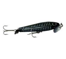 Charger l'image dans la galerie, Right Facing View of 5/8 oz Fred Arbogast JITTERSTICK Fishing Lure in BLACK SHORE. Available at Toad Tackle.