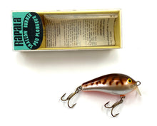 Load image into Gallery viewer, Right Facing View of Vintage TEAL LABEL Box RAPALA SHALLOW FAT RAP Fishing Lure in CRAYFISH