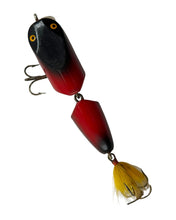 Cargar imagen en el visor de la galería, Top View of Wynne Precision Company DeLuxe Lures OL&#39; SKIPPER Jointed Wood Fishing Lure in Red with Black Scales
