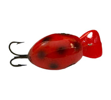 Load image into Gallery viewer, Top View of Vintage UBANGI Fishing Lure in ORANGE w/ BLACK DOTS 
