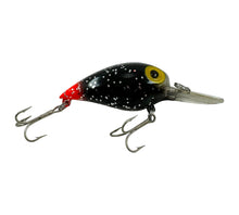 Cargar imagen en el visor de la galería, Right Facing View of SPECIAL PRODUCTION STORM LURES MAGNUM WIGGLE WART Fishing Lure. BLACK GLITTER / RED TAIL. Known to Collectors as MICHAEL JACKSON with RED TAIL.
