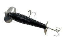 Load image into Gallery viewer, Jitterstick Stencil View of 5/8 oz Fred Arbogast JITTERSTICK Vintage Fishing Lure in BLACK SHORE
