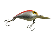 Load image into Gallery viewer, Right Facing View of STORM LURES WIGGLE WART Fishing Lure in FLUORESCENT RED STRIPE. Rare V8 Color!
