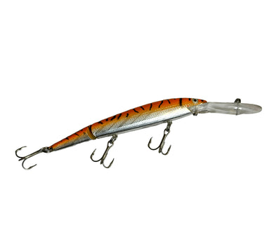 Right Facing View of REBEL LURES JOINTED SPOONBILL MINNOW Fishing Lure  in SILVER/ORANGE/BLACK STRIPES