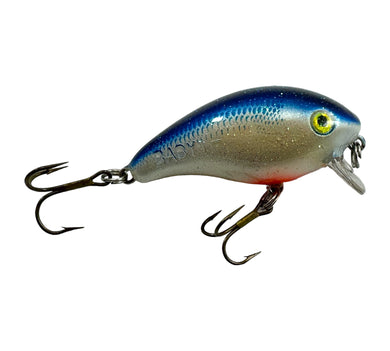 Right Facing View of Mann's Bait Company Baby One Minus Fishing Lure in BLUE SHAD CRYSTAGLOW