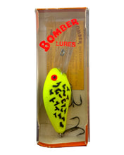 Load image into Gallery viewer, Cover Pic for BOMBER BAIT COMPANY MAG A MAGNUM DIVER Fishing Lure in DULL FLUORESCENT YELLOW COACHDOG. 9A Ditch Digger. 
