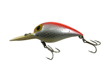 Charger l&#39;image dans la galerie, Left Facing View of STORM LURES WIGGLE WART Fishing Lure in FLUORESCENT RED STRIPE. Rare V8 Color!
