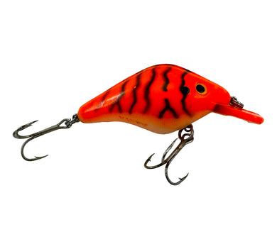 Right Facing View of MANN'S BAIT COMPANY RAZORBACK Vintage Fishing Lure in ORANGE/BENGAL TIGER. rare lure.