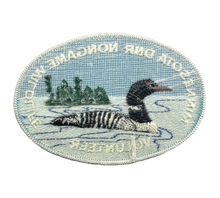 Load image into Gallery viewer, Back of MINNESOTA DNR NONGAME WILDLIFE VOLUNTEER PATCH.  LOON on a Northwoods Lake.
