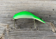 Load image into Gallery viewer, Right Facing Side View of HEDDON Phosphorescent MAGNUM TADPOLLY Fishing Lure in Original Vintage Heddon Geometric Box
