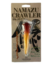 Load image into Gallery viewer, Front of Package View of VAGABOND HIGH QUALITY TACKLE NAMAZU CRAWLER INJECT Fishing Lure in ALBINO SPAWN
