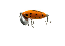 Load image into Gallery viewer, Left Facing View of FRED ARBOGAST JITTERBUG Vintage Fishing Lure in Orange with Black Dots
