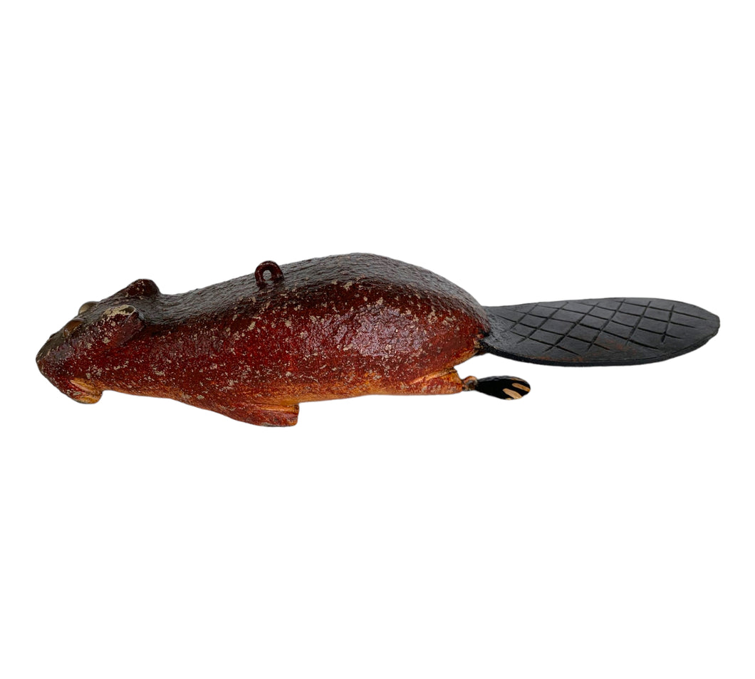 Left Facing View of Artist Jim Perkins Beaver Spearing Decoy for D.F.D. DULUTH FISHING DECOY