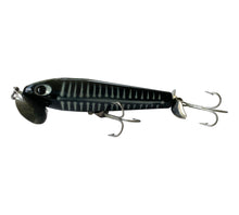 Load image into Gallery viewer, Left Facing View of 5/8 oz Fred Arbogast JITTERSTICK Fishing Lure in BLACK SHORE. Available at Toad Tackle.
