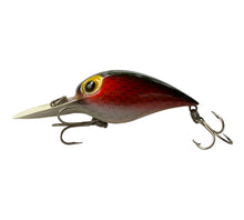 Load image into Gallery viewer, Left Facing View of  Vintage STORM LURES WIGGLE WART Fishing Lure in RED SCALE

