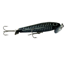 Load image into Gallery viewer, Right Facing View of 5/8 oz Fred Arbogast JITTERSTICK Fishing Lure in BLACK SHORE. Available at Toad Tackle.
